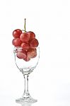 Red Grapes In A Glass Stock Photo
