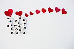 Red Hearts On White Snow Stock Photo