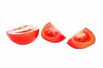 Red Sliced Isolated Tomatoes With Water Drops Stock Photo