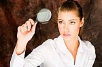 Researcher Looking Through Magnifier Glass Stock Photo