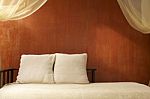 Resort And Spa Bed With Cushions Stock Photo