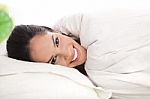 Resting Woman Cover In White Sheet Stock Photo