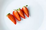 Ripe Red Strawberries On A Plate Stock Photo
