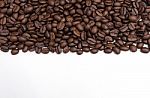 Roasted Coffee Beans On White Stock Photo