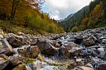 Rock River Bed In The Autumn Alps Stock Photo