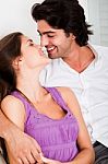 Romantic Young Couple Kissing Each Other Stock Photo