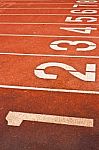 Running Track With Numbered Lanes Stock Photo