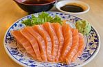 Salmon Fish With Wasabi And Sauce On Table Wood In Restaurant Stock Photo