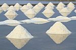 Salt Fields With Piled Up Sea Salt In Thailand Stock Photo
