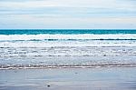 Sand Beach With Blue Ocean Stock Photo