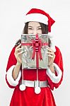 Santa Claus Hat With Grey Christmas Gift Box Stock Photo