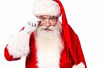 Santa Claus  Looking Above His Spectacles Stock Photo