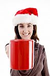 Santa Hat Woman Holding Cup Stock Photo