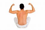 Sat Man Showing Muscles Back Stock Photo