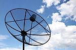 Satellite Dish And Clouds On Blue Sky Stock Photo