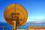 Satellite Dish On Back Side On Offshore Platform With Sky Stock Photo