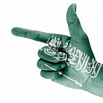 Saudi Arabia Flag On Hand Stock Photo