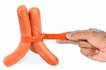 Sausages And Tightened Belt Stock Photo