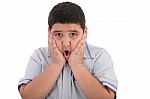 Scared Litle Kid Boy Holding Hands On Face And Screaming Isolate Stock Photo