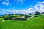 Scenery View Of Peel Castle Constructed By Vikings On Top Of Peel Hill On A Clear Blue Sky, Isle Of Man Stock Photo