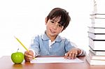 School Boy Doing His Homework Stock Photo