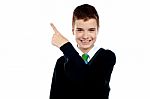 School Boy With Pointing Up Stock Photo