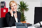 Secretary Talking On Phone Stock Photo