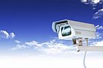 Security Camera Or CCTV On Blue Sky Stock Photo