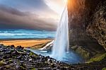 Seljalandsfoss Waterfall During The Sunset, Beautiful Waterfall In Iceland Stock Photo