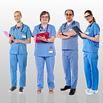 Senior Team Of Doctors Posing With A Smile Stock Photo