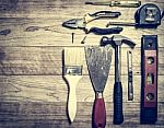 Set Of Tools Over A Wood Background Stock Photo