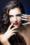 Sexy Beauty Girl With Red Lips And Blue Nails Stock Photo
