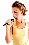 Sexy Female Singing In Microphone Stock Photo