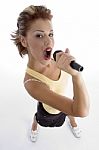 Sexy Woman Singing In Microphone Stock Photo