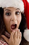 Shocked Girl Wearing Santa Hat Stock Photo