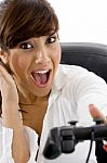 shocked lady Playing Video game Stock Photo