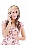 Shocked Woman Talking On Phone Stock Photo