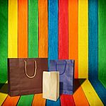 Shopping Bag On Wood Background Stock Photo