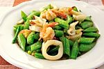 Shrimps Squids With Green Peas Stock Photo