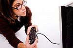 Side Pose Of Man Playing Videogame Stock Photo