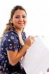 Side Pose Of Model Holding Carry Bags Stock Photo