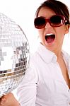 Side Pose Of Shouting Woman Holding Disco Ball Stock Photo