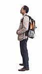 Side View Of Backpacker Standing On White Stock Photo