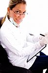 Side View Of Doctor Writing Prescription Stock Photo