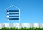 Signpost And Blue Sky Stock Photo