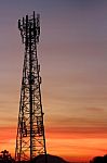 Silhouette Communication Tower Telecoms At Sunset Stock Photo