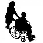 Silhouettes Of Woman In Wheelchair Stock Photo