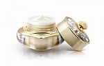 Single Golden Crown Cosmetic Jar On White Background Stock Photo