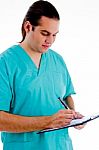 Smart Doctor With Clipboard Stock Photo