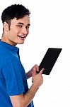 Smart Guy Holding Touch Pad Stock Photo